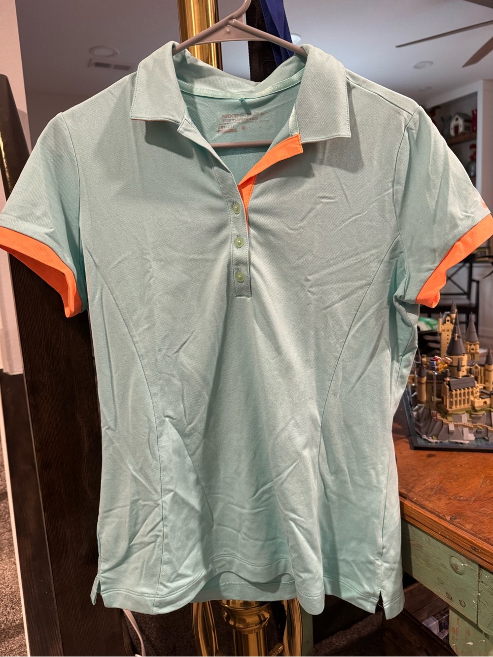Light Aqua Polo Golf Shirt with Orange Trim - Women’s